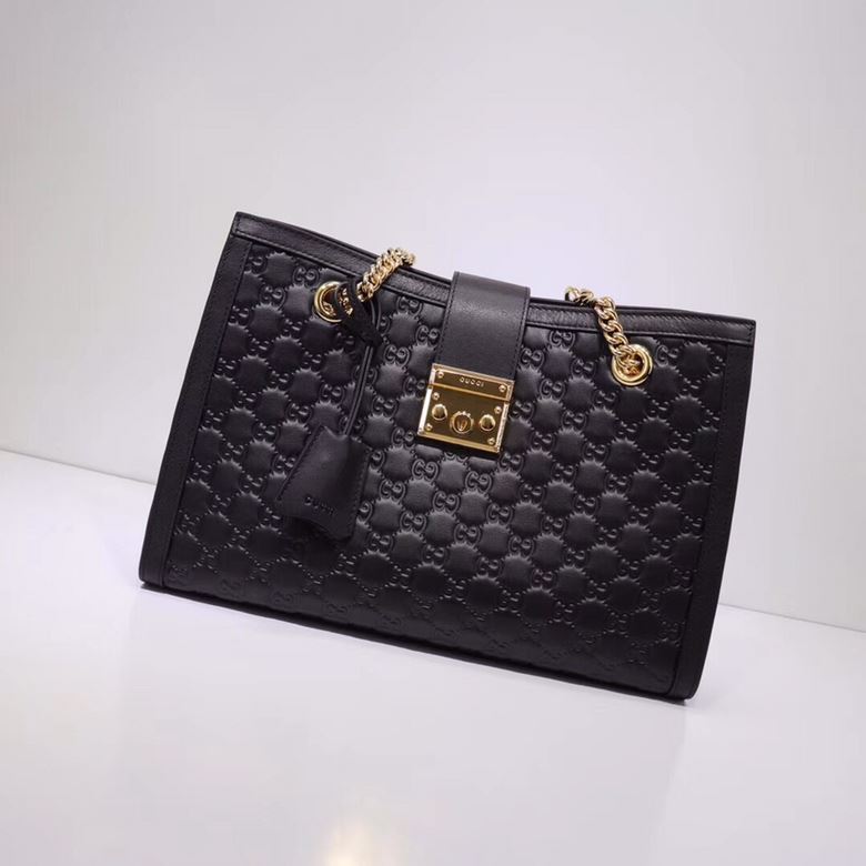 G*u*i shopping bags